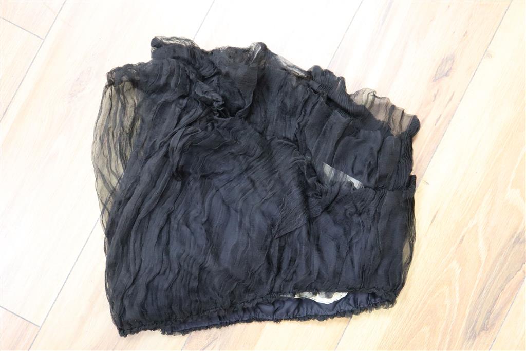 Queen Victoria interest: A black silk sleeve. Provenance, Vendors relation was in service to Queen Victoria